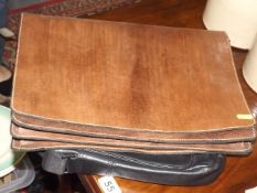 A Folding Tan Leather Case & One Other
