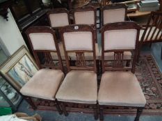 A Set Of Six Upholstered Oak Dining Chairs