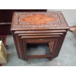 A Set Of Four Hardwood Nest Of Tables With Carved