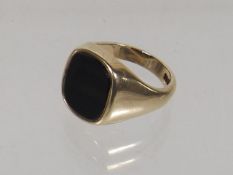 A Large 9ct Gold Gents Cygnet Ring