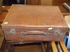 A Small Leather Suitcase