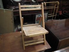 A Small Childs Folding Chair