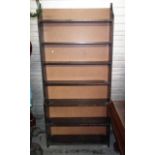 A Tall Stained Wood Shelf Unit