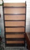 A Tall Stained Wood Shelf Unit