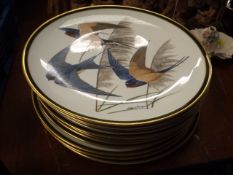 A Quantity Of Decorative Plates With Bird Designs