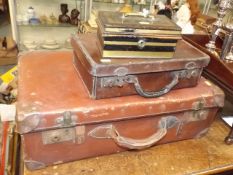 Two Suitcases & A Money Box