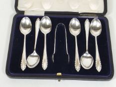 A Cased Set Of Silver Spoons With A Set Of Sugar T