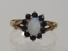 A Ladies 9ct Sapphire & Opal Ring