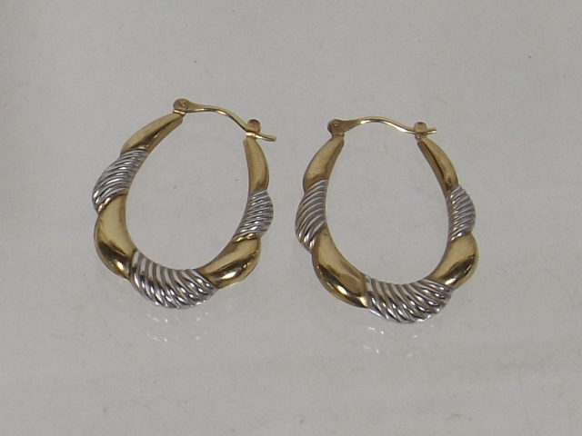 A Pair Of 9ct Gold Ear Rings