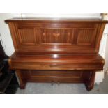 An Emil Schroder Iron Overstrung Upright Piano