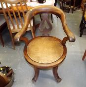 A Captains Style Chair With Lion Feet