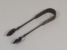 A Set Of Silver Tongs