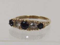 A Ladies 9ct Gold Ring With Sapphires & White Ston