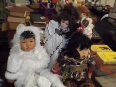 Two Oriental Dolls & Two Others