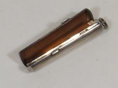 A Silver Cheroot Case With Gold Rimmed Amber Chero