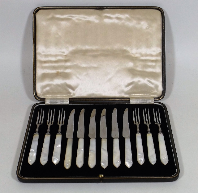 A Boxed Pastry Set With Mother Of Pearl Handles