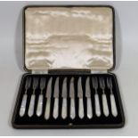A Boxed Pastry Set With Mother Of Pearl Handles