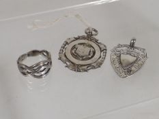 A Silver Celtic Style Ring & Two Medals