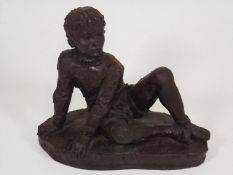 A Karin Jonzen Sculpture Of Young Boy
