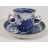 A Nanking Two Handled Tea Cup & Saucer