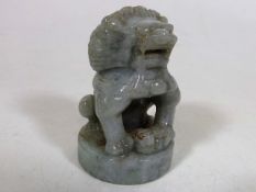 A Carved Jade Style Stone Figure Of Chinese Lion