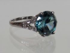 A Ladies White Metal Diamond & Zircon Ring