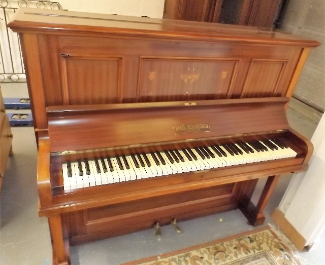 An Emil Schroder Upright Piano