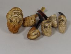 A Collection Of Six Carved Meerschaum Pipes