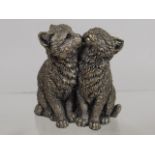 A Pair Of Sterling Silver Cats
