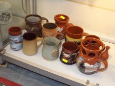 A Quantity Of Studio Pottery Mugs & Puzzle Jug