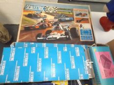 A Vintage Scalextric Set With Transformer & Access