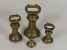Four Antique Brass Weights