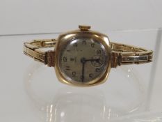 A Ladies 9ct Gold Case & Strap Tudor Rolex Wristwa