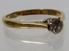 An 18ct Gold Solitaire Ring
