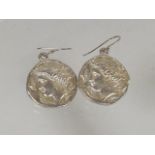 A Pair Of Silver Coin Ear Rings