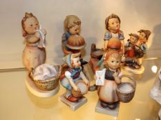 A Collection Of Goebel Hummel Figures