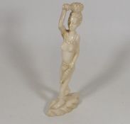An Early 20thC. African Ivory Carded Figure