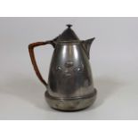 An Archibald Knox Style Tudric Arts & Crafts Jug W