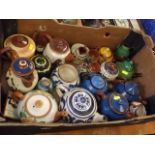 A Tray Of Devon Pottery Teapots