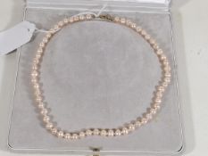 A Set Of Ladies Cultured Pink Pearls