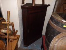 A Stained Wall Mounted Corner Cabinet With Brass F