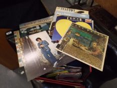 A Boxed Quantity Of Vinyl LP's & Singles Along Wit