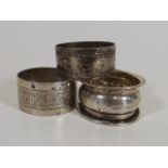 Two Silver Napkin Rings & One White Metal