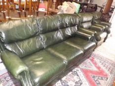 A Three Piece Green Leather Suite