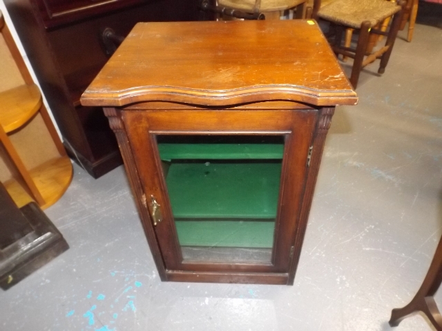 A Low Level Mahogany Display Cupboard