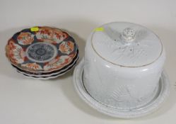A Victorian Cheese Dome With Three Japanese Imari