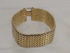 A Large Ladies Gold Plated Bracelet
