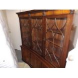 A Glazed Mahogany Bookcase With Cupboards