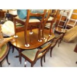 A Regency Style Pedestal Table With Four Chairs