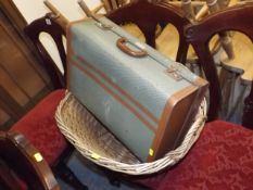 A 1950'S Suitcase Twinned With Wicker Basket